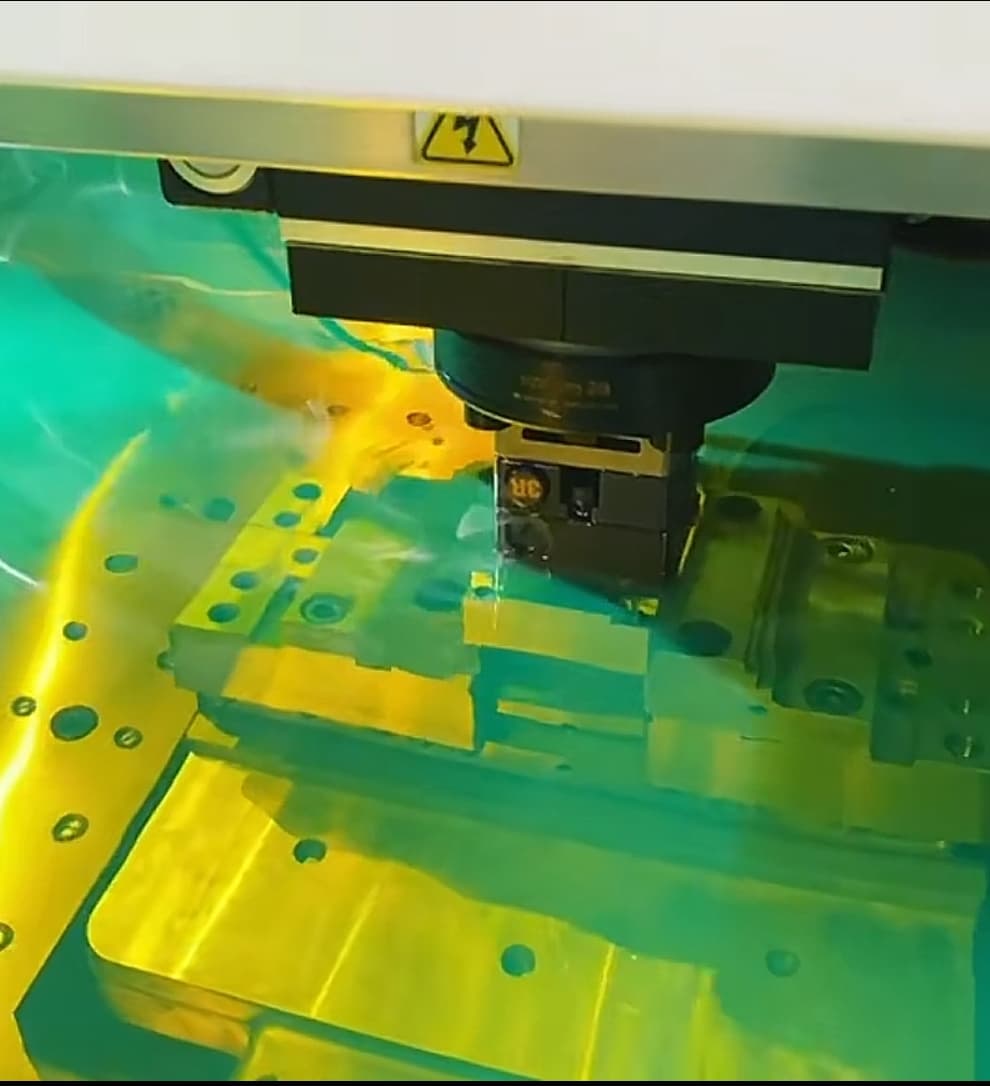 EDM machine processing a custom injection mold component